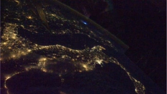 ’The boot’ of Italy with its sparkling cities at night